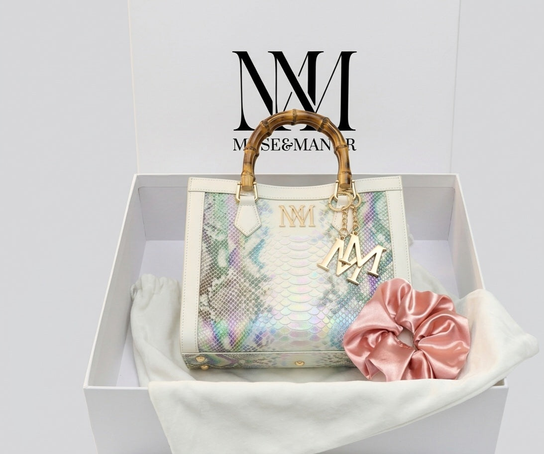 Iridescent snakeskin print paired with iconic natural bamboo handles + Plus Free Gift On Us!