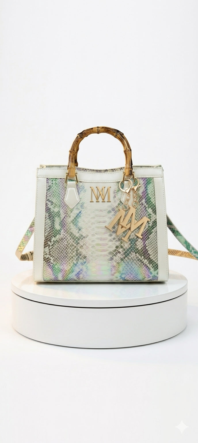 Iridescent snakeskin print paired with iconic natural bamboo handles + Plus Free Gift On Us!