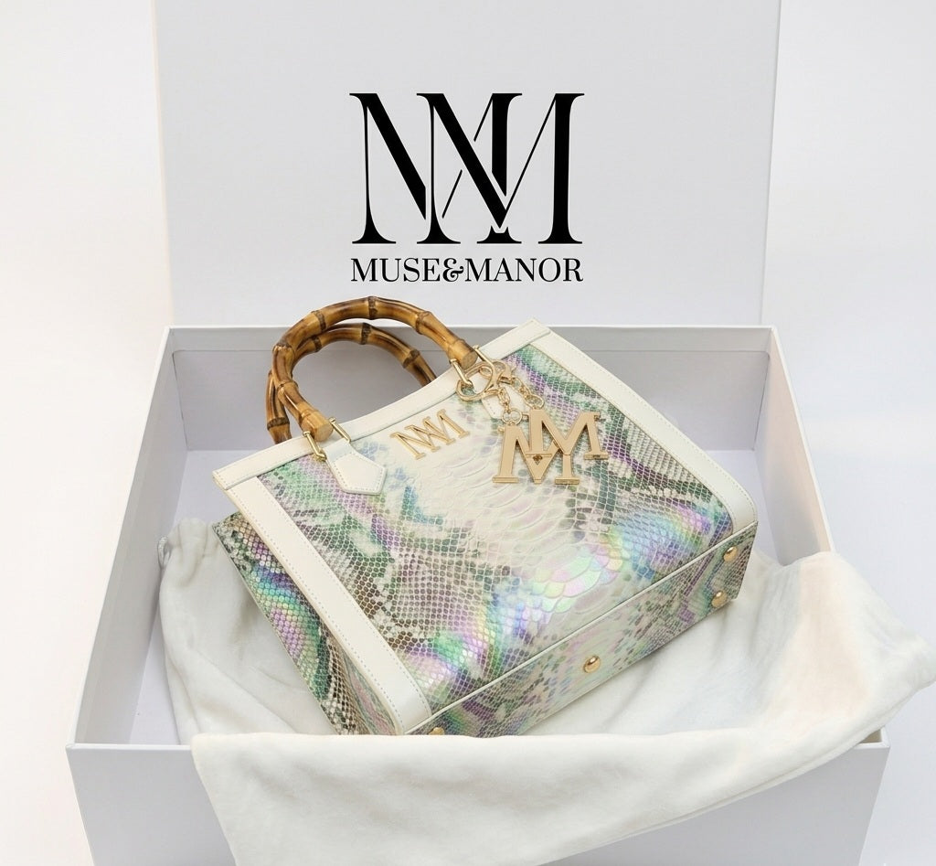 Iridescent snakeskin print paired with iconic natural bamboo handles + Plus Free Gift On Us!