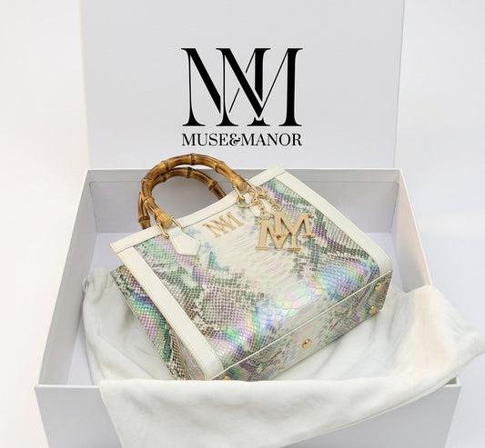 Iridescent snakeskin print paired with iconic natural bamboo handles + Plus Free Gift On Us!