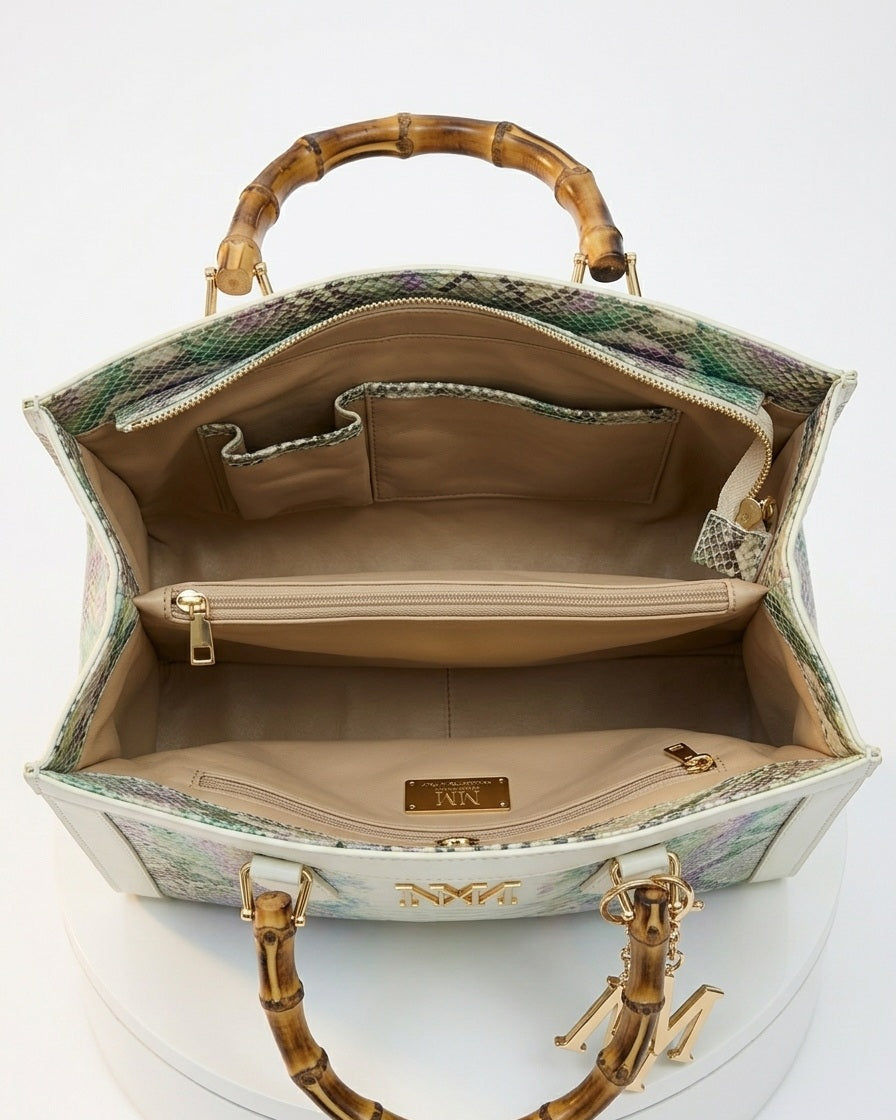 Iridescent snakeskin print paired with iconic natural bamboo handles + Plus Free Gift On Us!