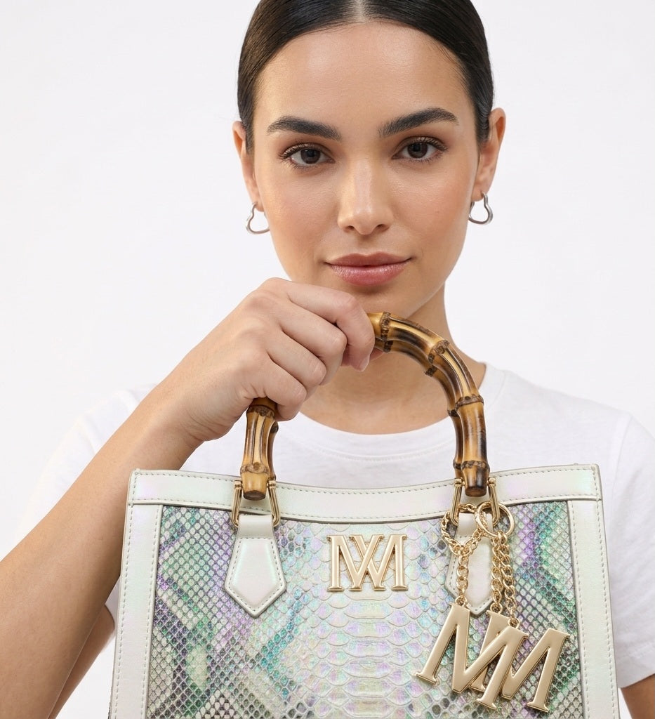 Iridescent snakeskin print paired with iconic natural bamboo handles + Plus Free Gift On Us!